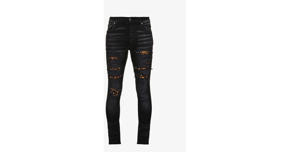 Amiri Leopard Print-panel Fitted Stretch-denim Jeans in Black for Men ...