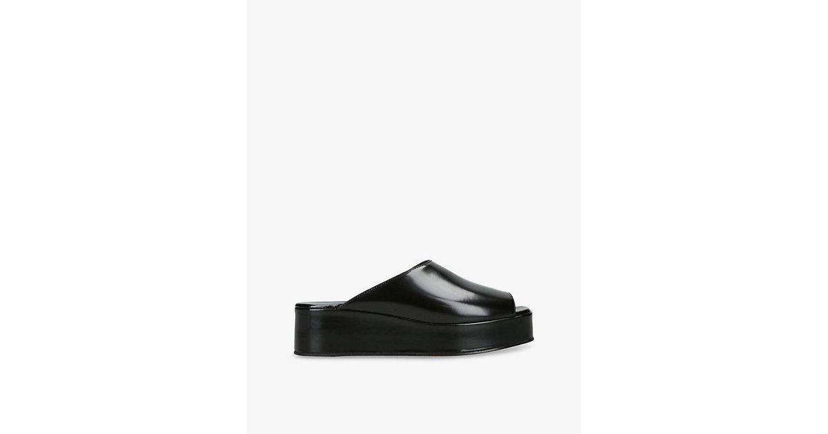 【関税&送料込】The Row Black Emi Flatform Sandals The Row Emi Flatform Sandal in Black | FWRD