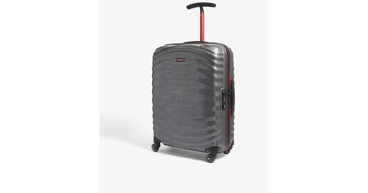 red and black suitcase