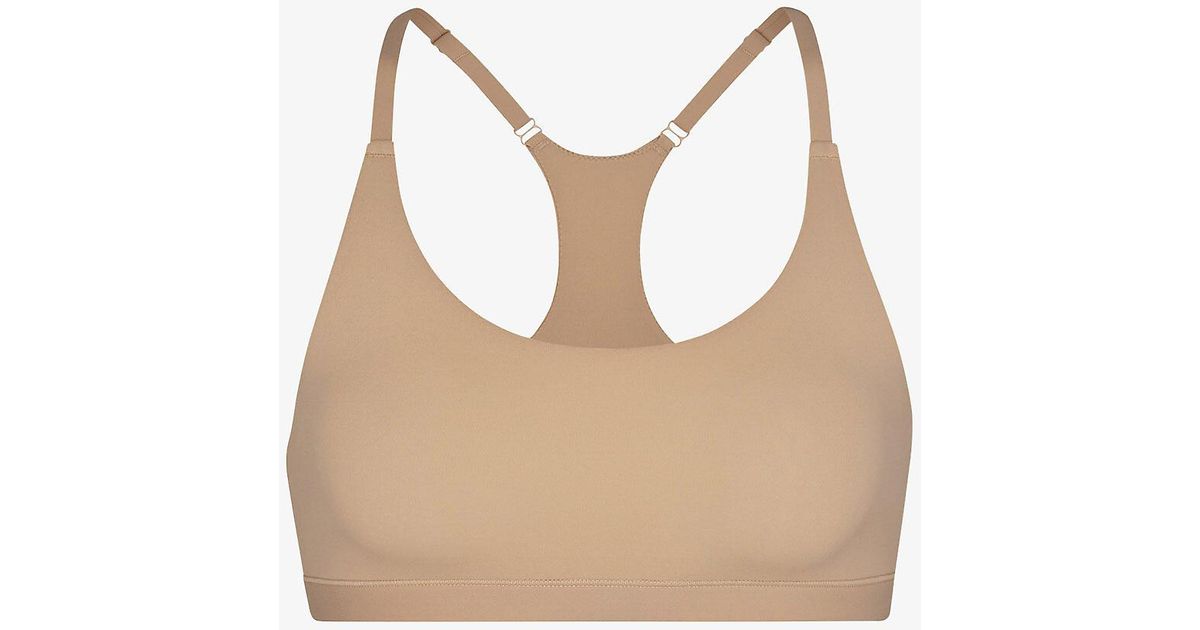 Skims Racerback Stretchwoven Bra in Natural Lyst Canada