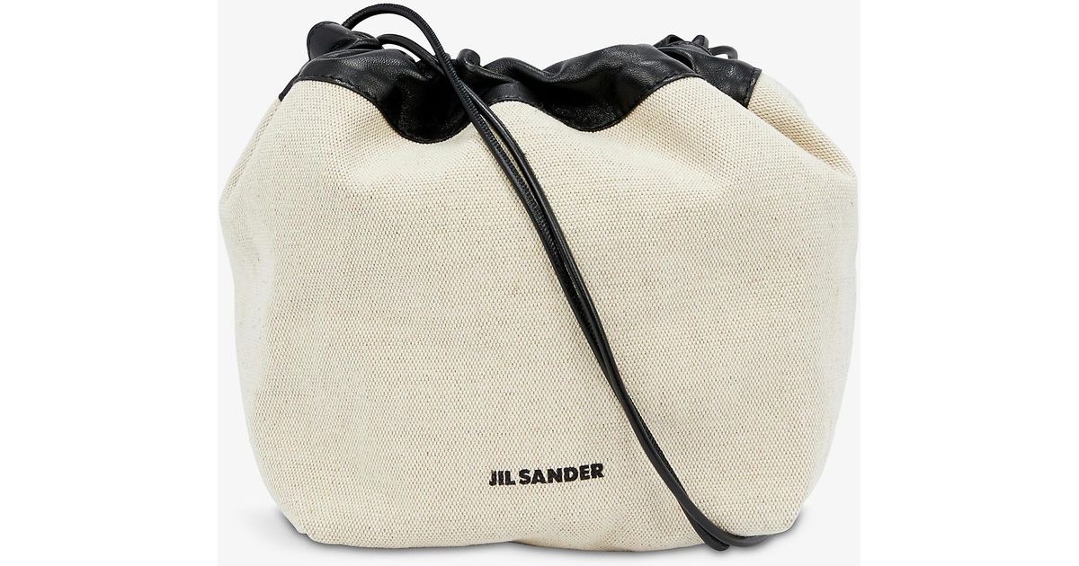 Jil Sander Brand-print Contrast-trim Woven-leather Bucket Bag in Black ...