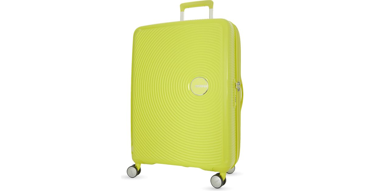 American Tourister Soundbox Expandable Four-wheel Suitcase 67cm in Tropical  Lime (Green) - Lyst