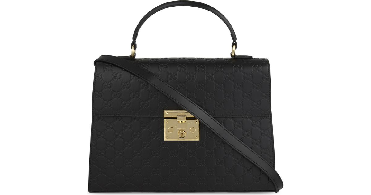 gucci padlock embossed leather tote in black
