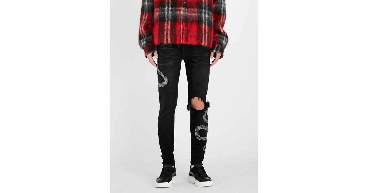 Snake amiri jeans 2025