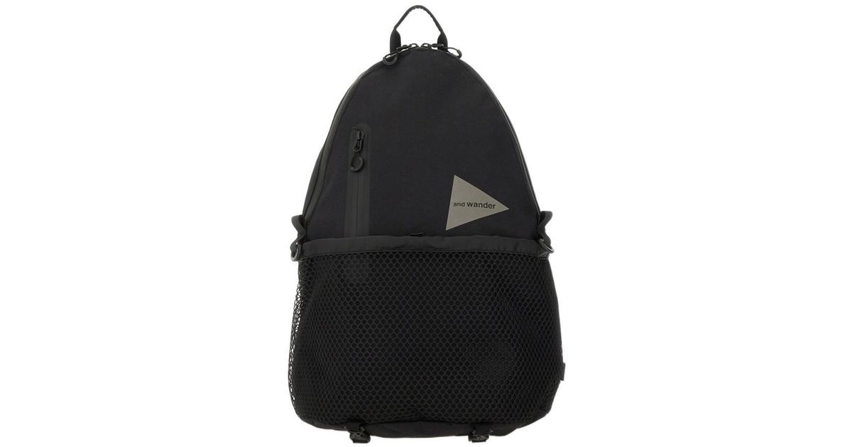 and wander Logo Printed Backpack in Black for Men | Lyst