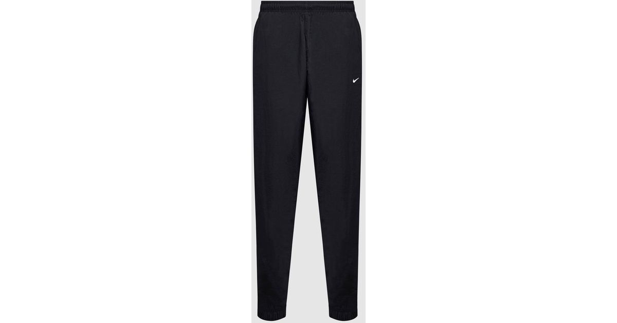 Nike Synthetic Solo Swoosh Woven Track Pant in Black/White (Blue) for ...