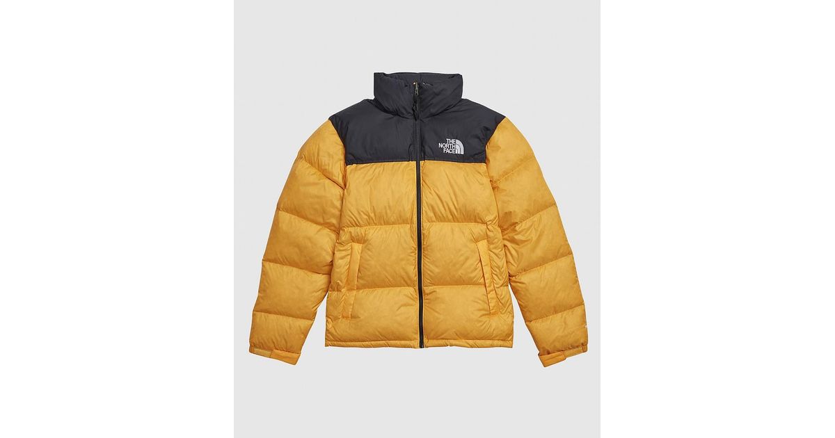 the north face yellow puffer
