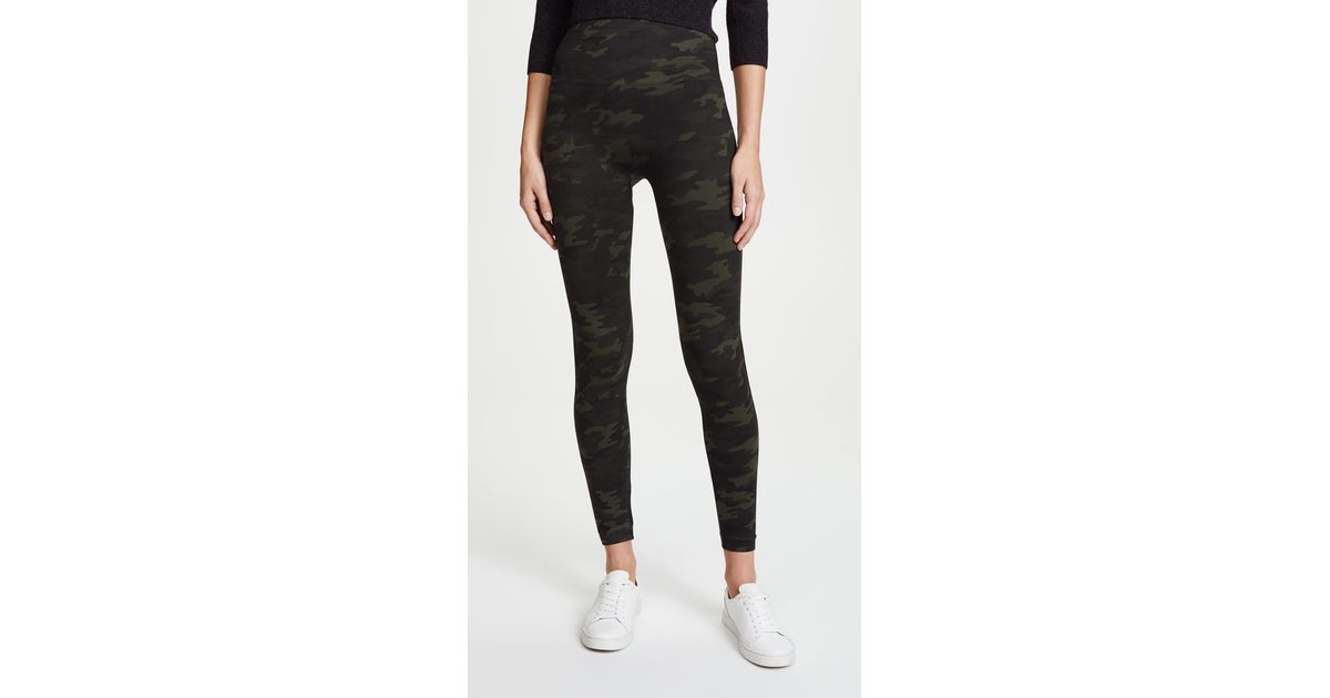 https://cdna.lystit.com/1200/630/tr/photos/shopbop/994d06bd/spanx-Green-Camo-Seamless-Camo-Leggings.jpeg