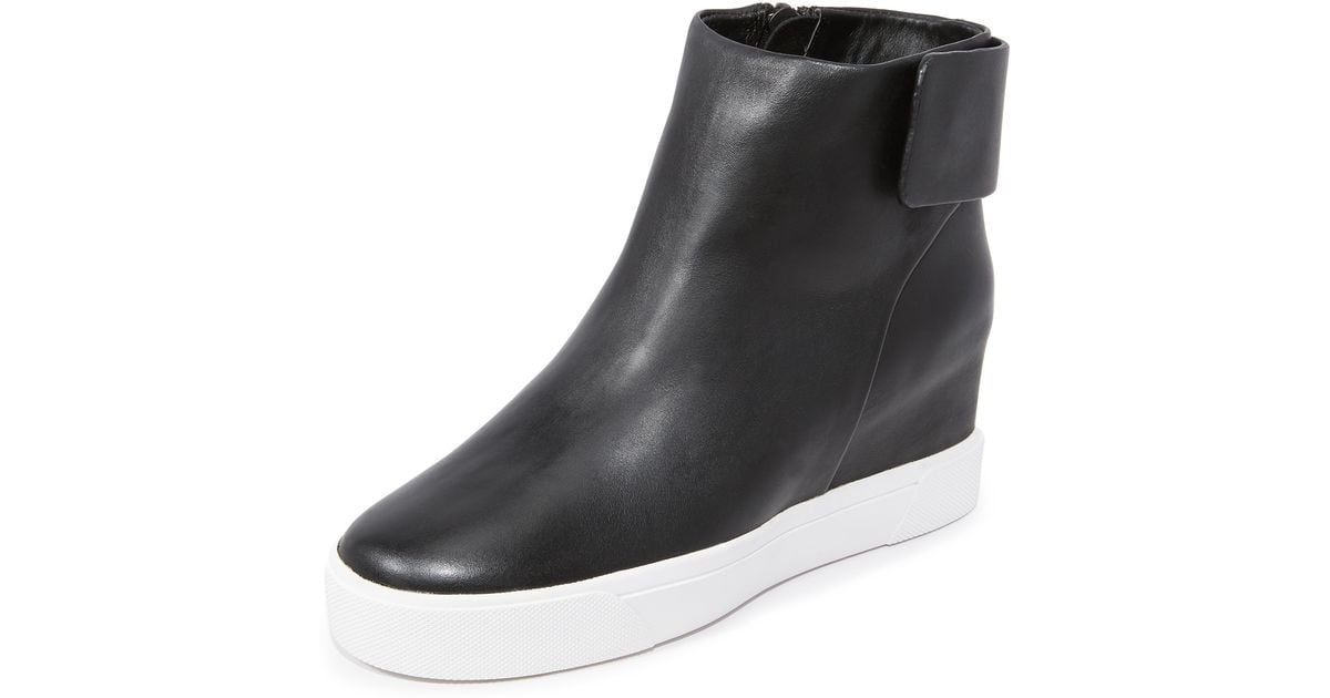 kacy camo sneaker wedge