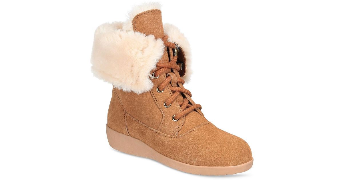 heeled shearling lace up boot