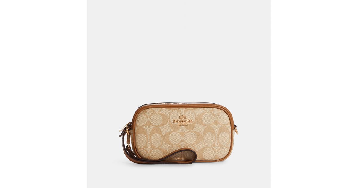 Coach Outlet Jamie Wristlet In Signature Canvas Lyst