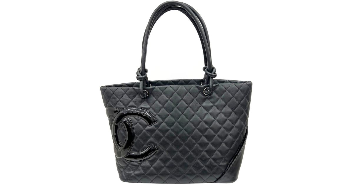 Chanel Pre Owned 2003 Medallion quilted tote bag - ShopStyle