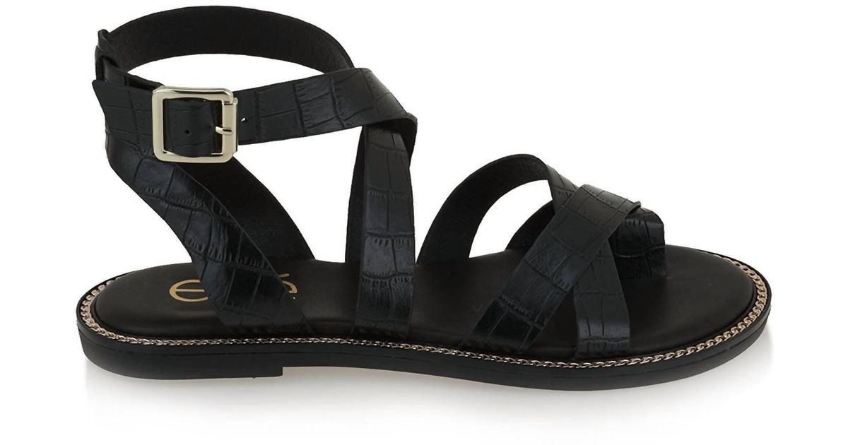 Exe' Alexia Flat Strappy Sandal in Black | Lyst