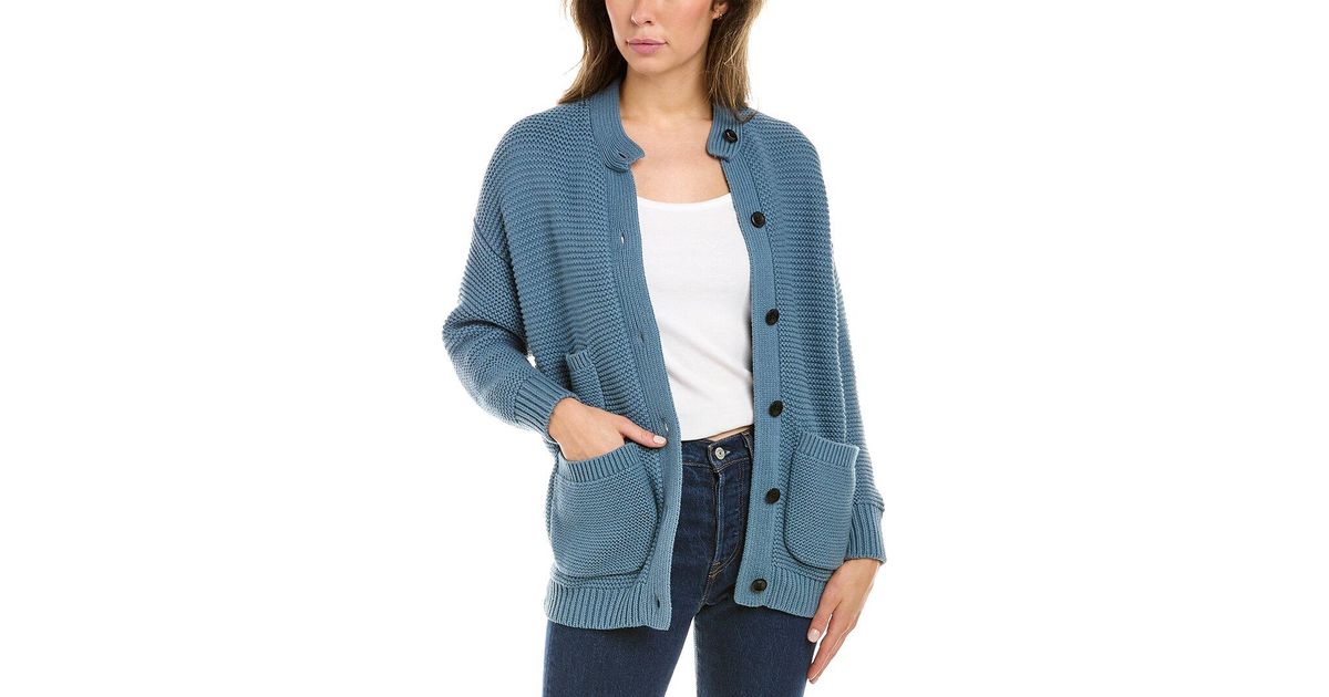 cup of jo reading sweater