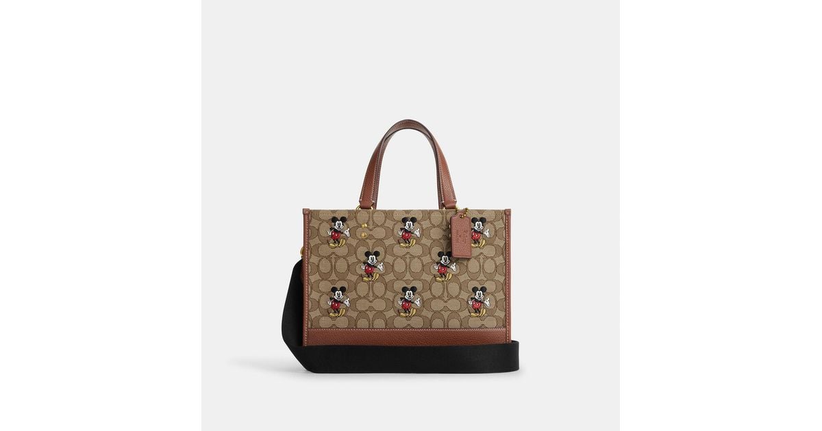 Coach outlet disney new arrivals