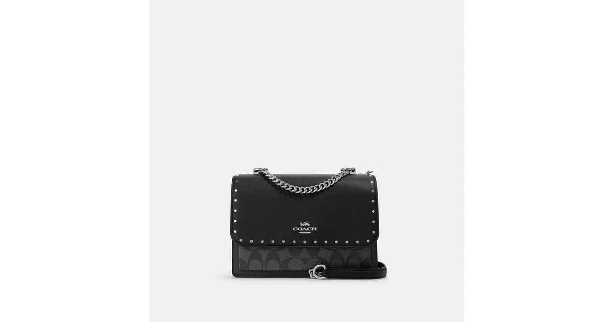 Coach Outlet Klare Crossbody In Signature Canvas With Rivets in Black