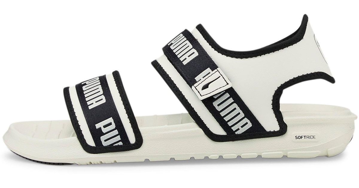 PUMA Rubber Signature Softride Sandals in Black | Lyst