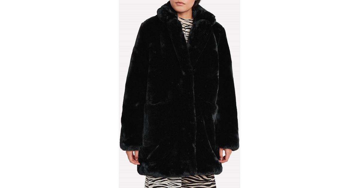 Apparis Sophie Faux Fur Coat In Noir in Black | Lyst