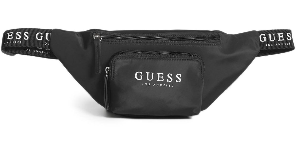 Guess Factory Logo Tape Fanny Pack in Black | Lyst