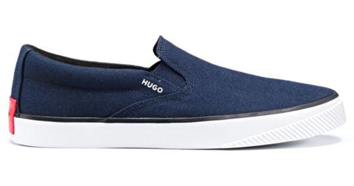 HUGO Boss Cotton Canvas Slip On Trainers With Red Logo Label in Dark