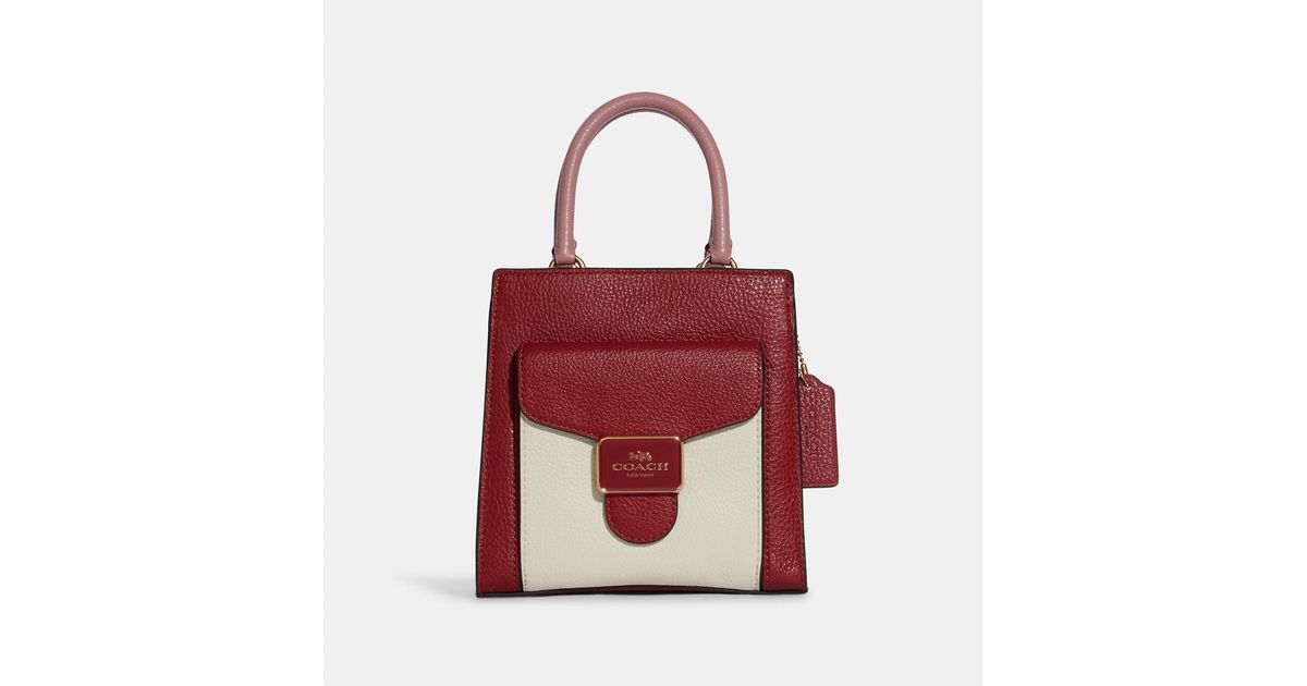 mini pepper crossbody with heart petal print