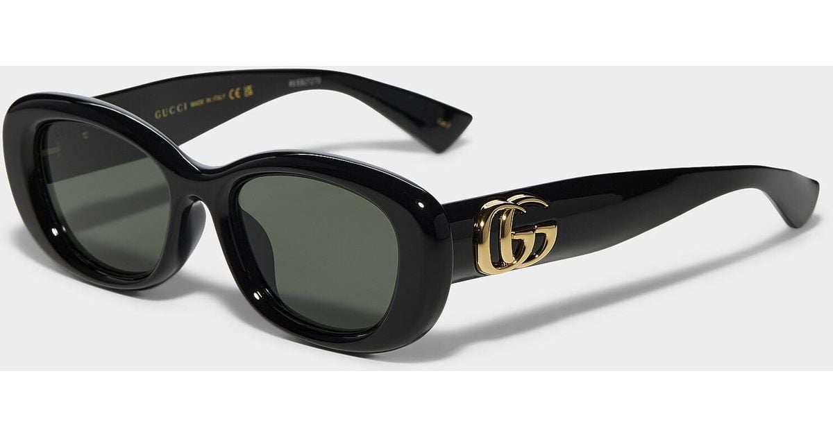 gucci-logo-temples-oval-sunglasses-in-black-lyst