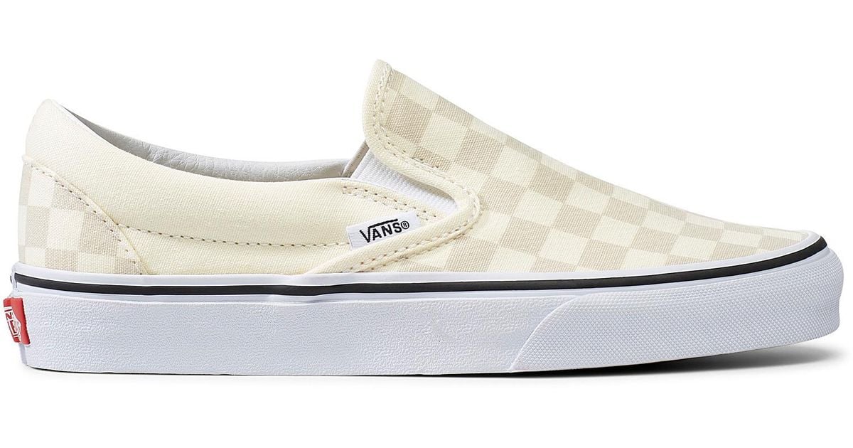 tan checkered slip on vans