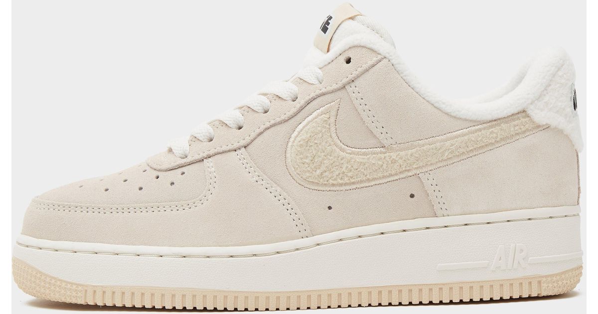 white and beige air force 1