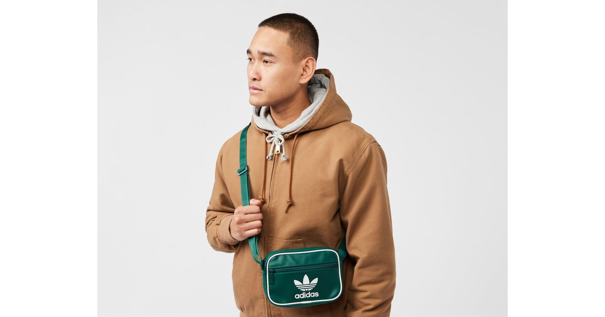 Adidas originals flight bag in khaki deals