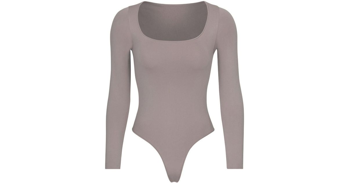 Skims Essential Long Sleeve Scoop Neck Bodysuit Lyst