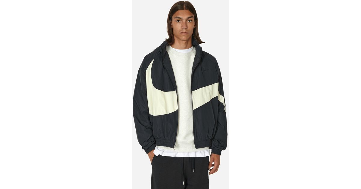 nike woven track jacket in black