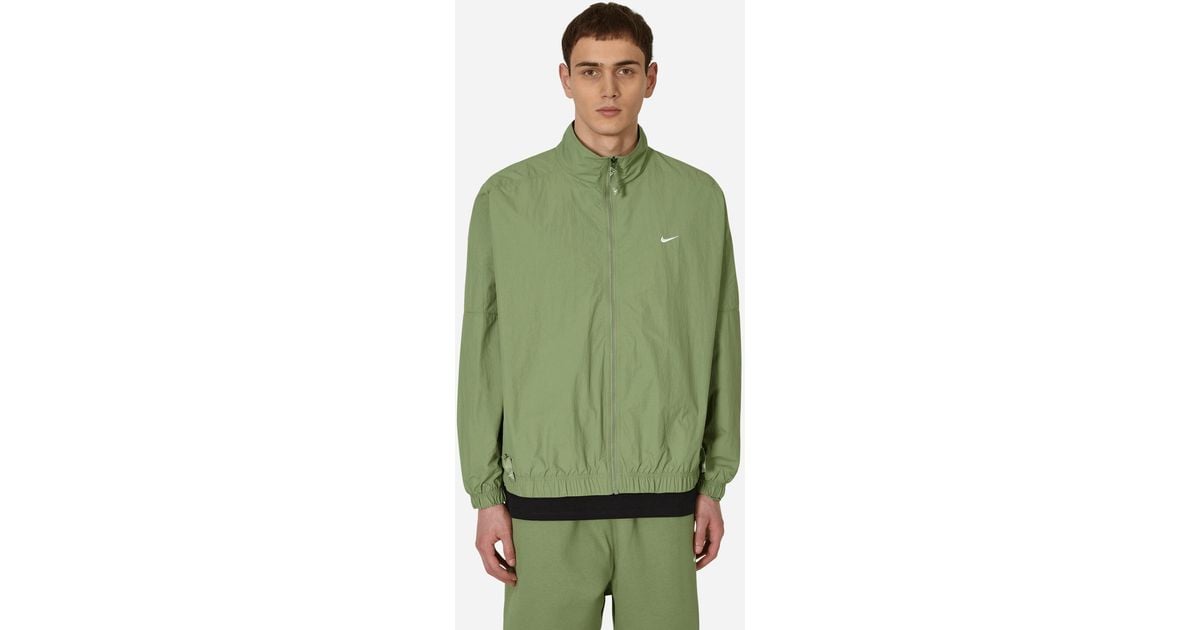 Nike Solo Swoosh Woven Track Jacket Green for Men | Lyst