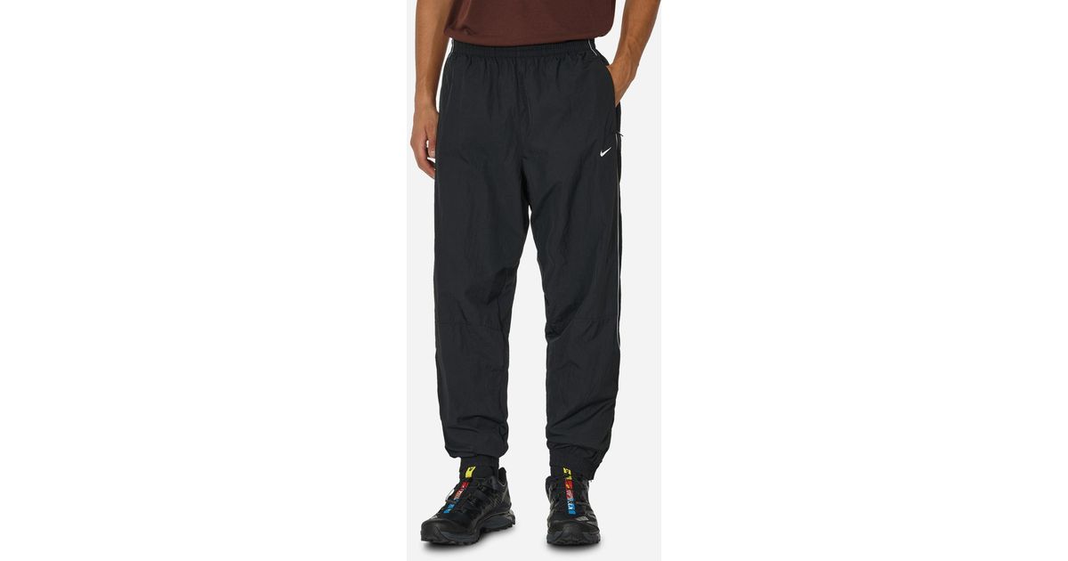 Nike Solo Swoosh Woven Track Pants Black for Men | Lyst