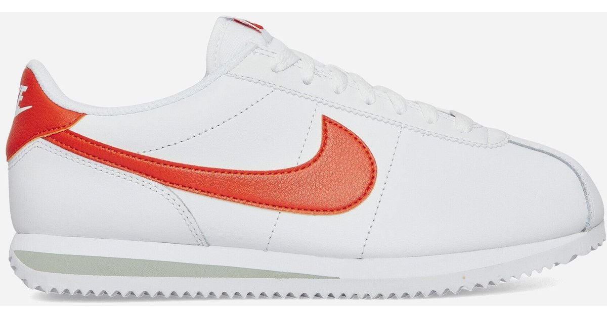Nike cortez orange and white sales