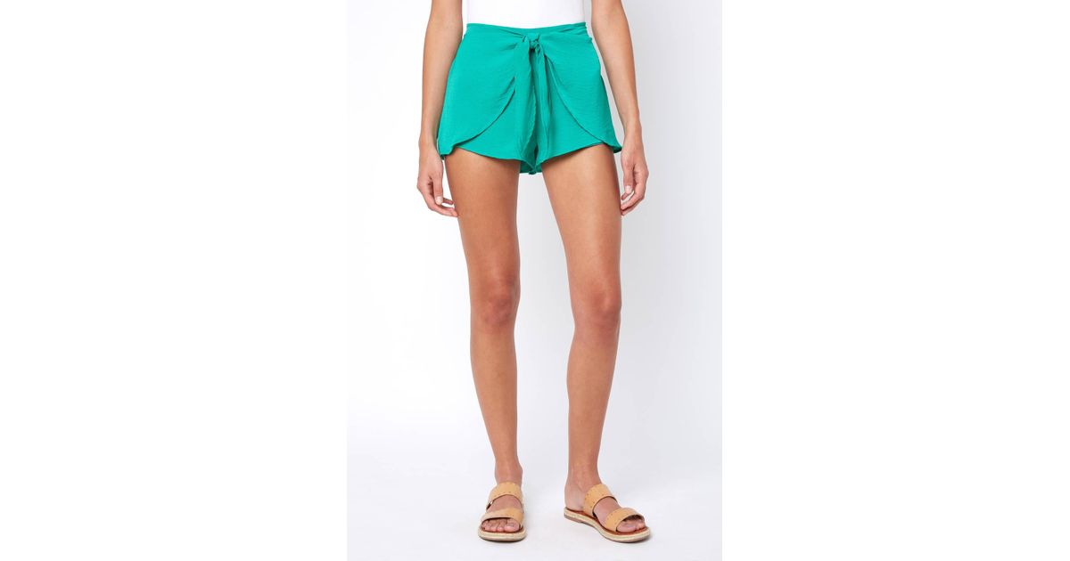 green flowy shorts