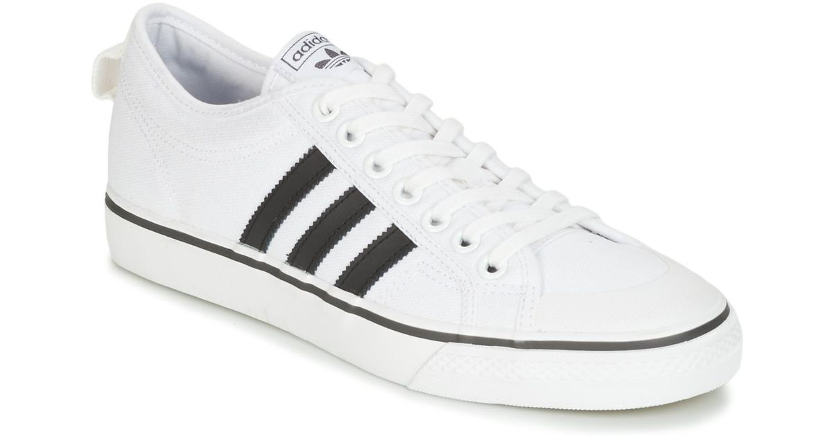 mens white nizza trainers
