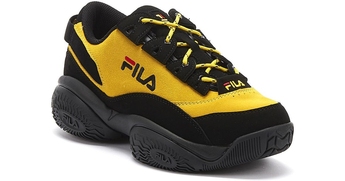 yellow and black fila shoes