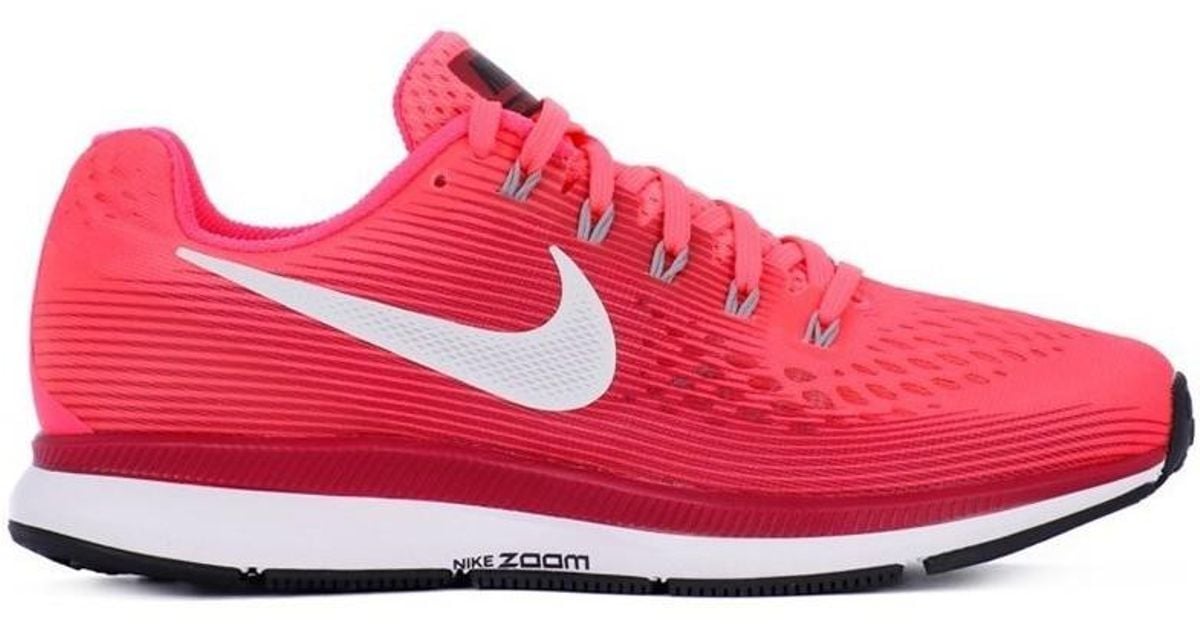 red nike trainers