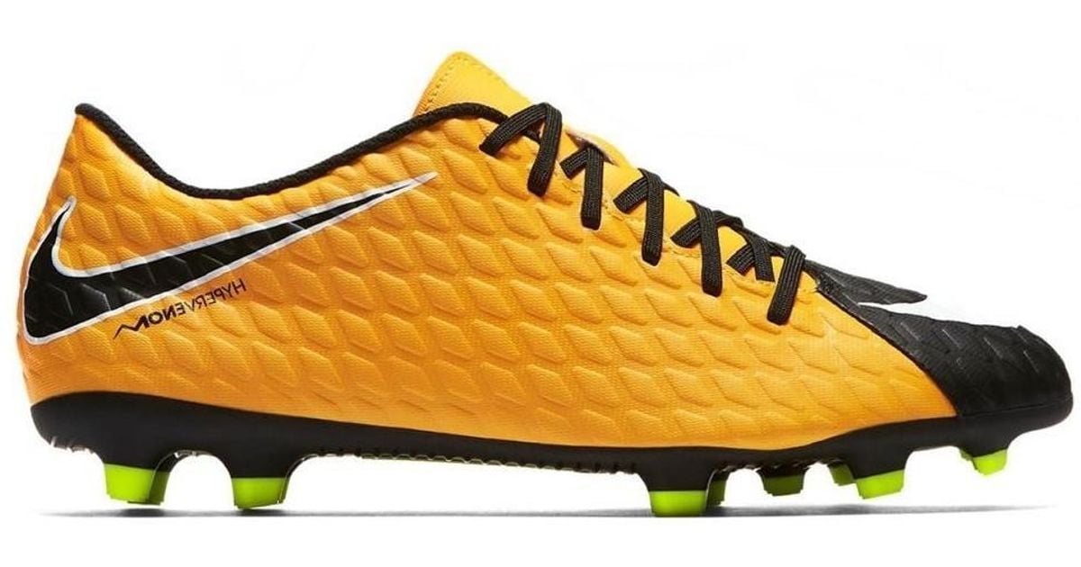 nike yellow and black football boots