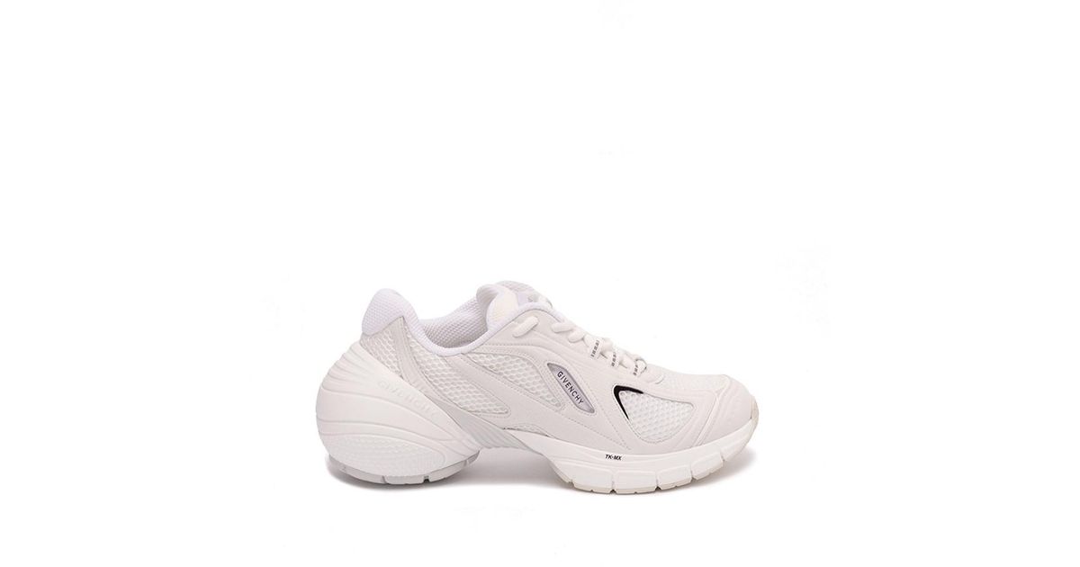 in style white sneakers