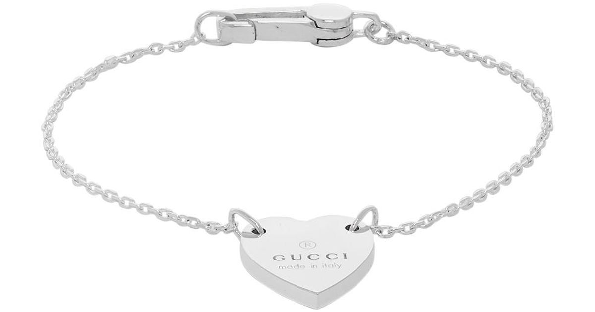 heart bracelet with gucci trademark