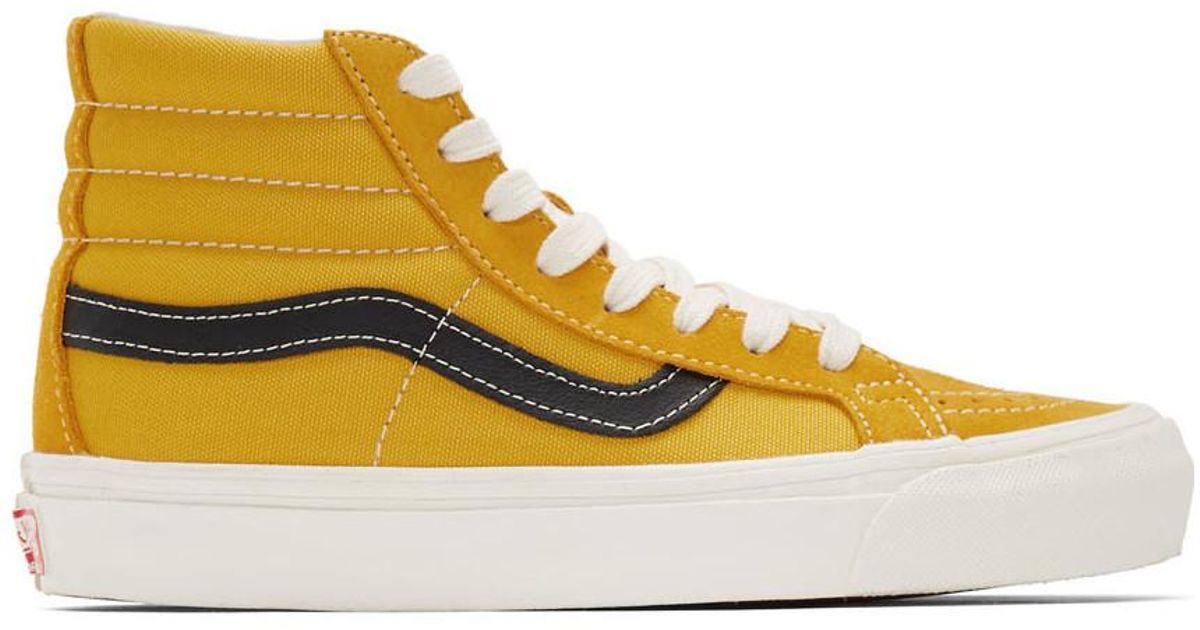 black and yellow high top vans