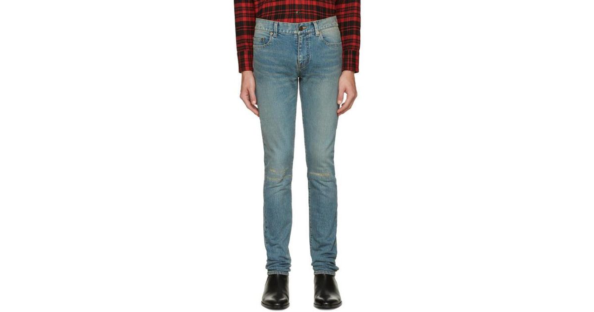 saint laurent ripped knee jeans