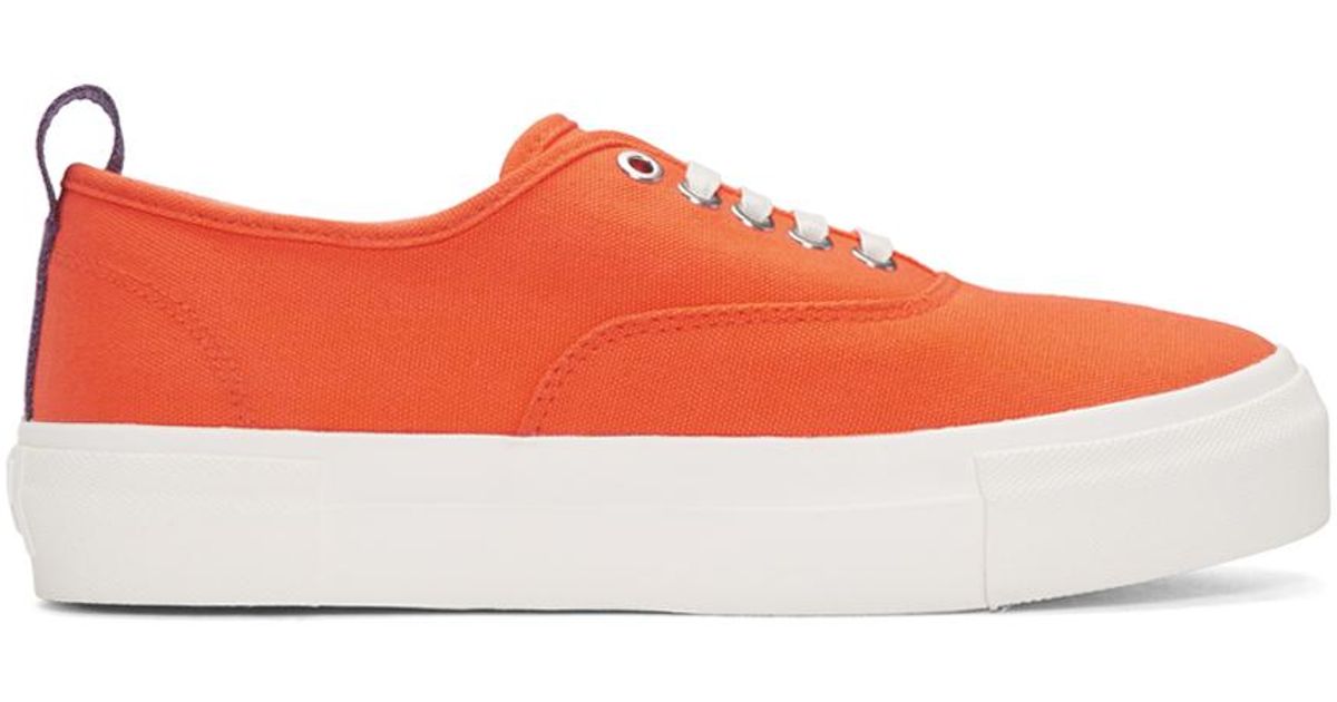 orange canvas sneakers