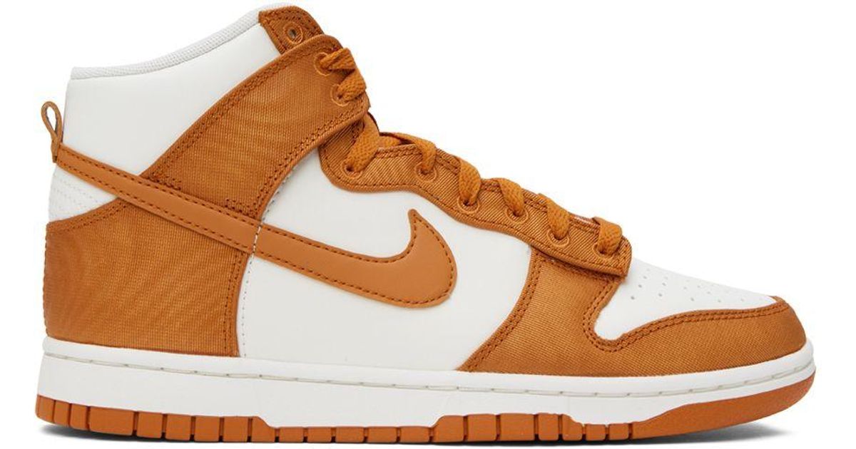 nike orange and white sneakers