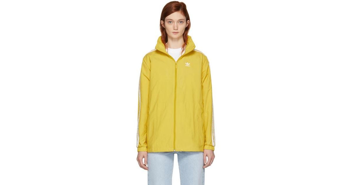 adidas stadium jacket yellow