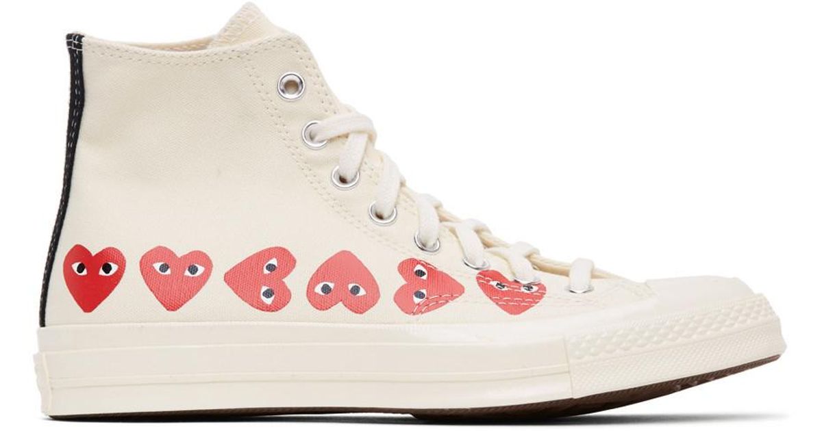 comme des garcons converse with multiple hearts