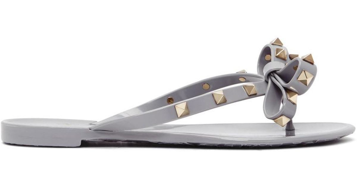 Valentino Rubber Grey Valentino Garavani Rockstud Jelly Bow Sandals in Gray  - Lyst