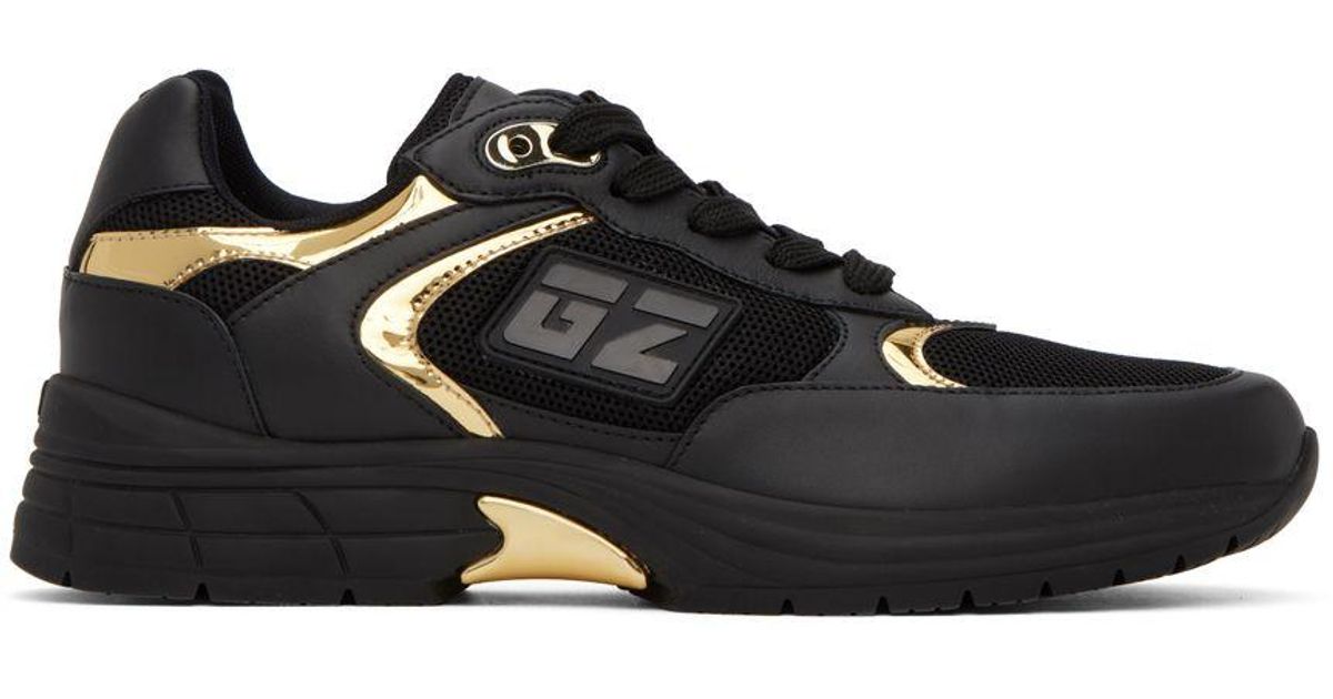 giuseppe zanotti black and gold sneakers