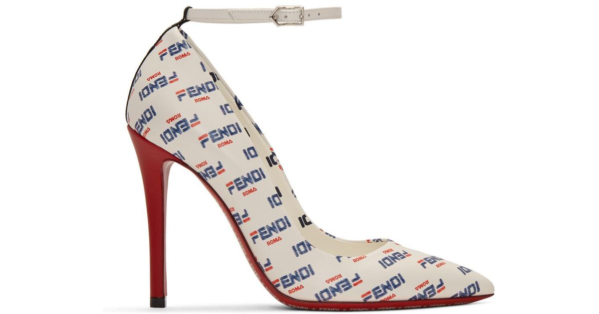 gold and white platform heels